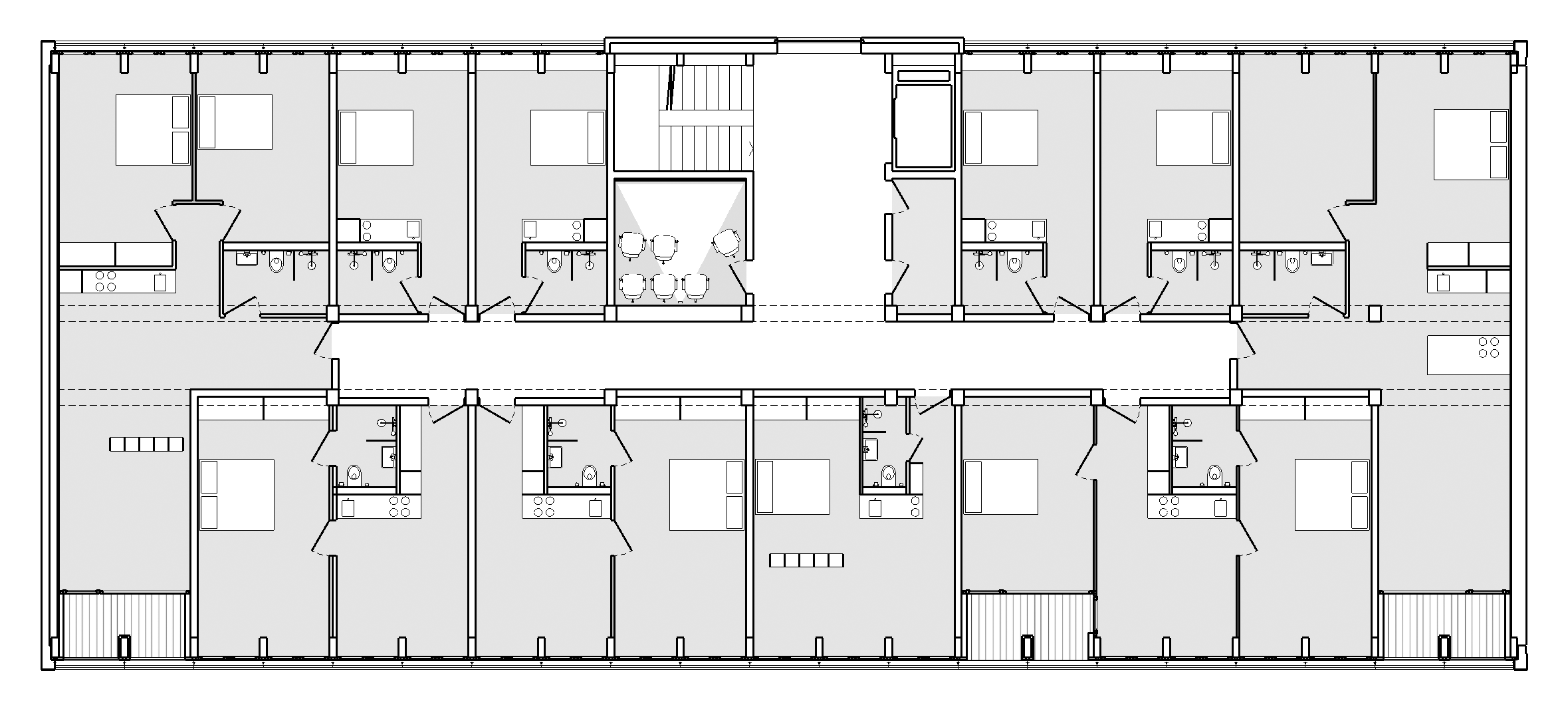  von KGRUPPE Architekten Basel - Grundriss eines Wohngebäudes mit mehreren Apartments, Küche, Wohnzimmer und Bädern.